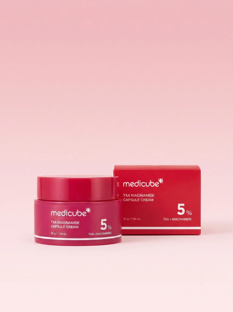Medicube TXA Niacinamide Capsule Cream. Envase de la crema facial coreana junto a su caja original de empaque.